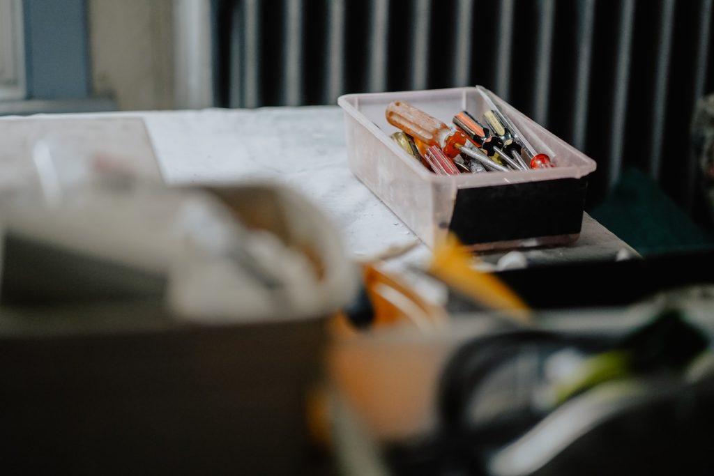 white plastic container on white table